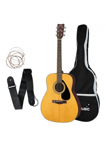 yamaha F310 acoustic guitar with bag strings and strap
